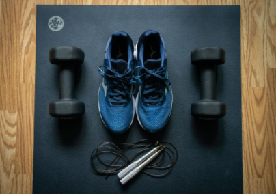 Running shoes, skipping rope and weights for working out