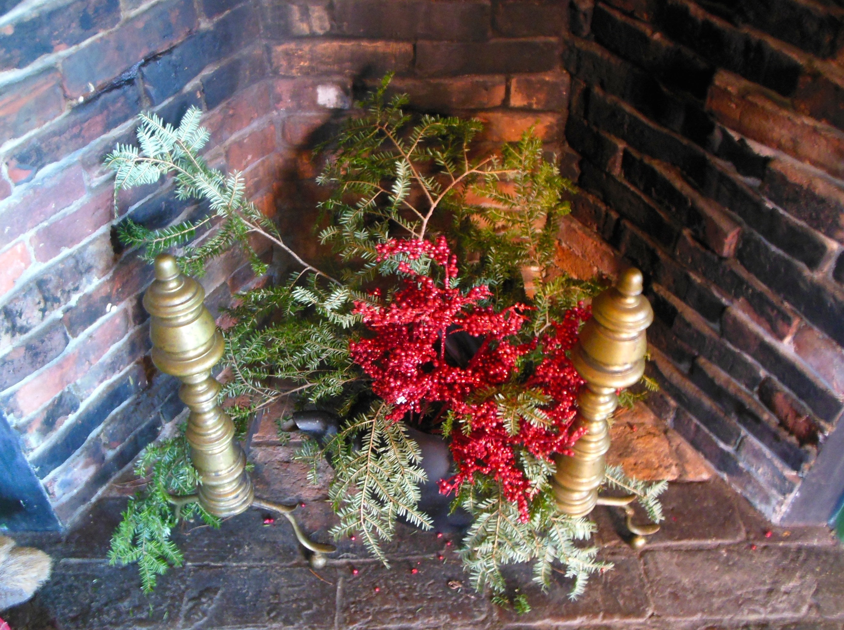 floral arrangement in fireplace