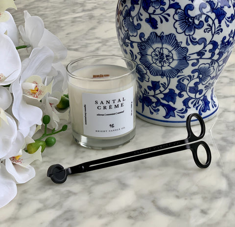 How to use a wick trimmer, why you should trim your candle wick, candle care tips, how to trim a candle wick, shop for wick trimmers at Bright Candle Co.