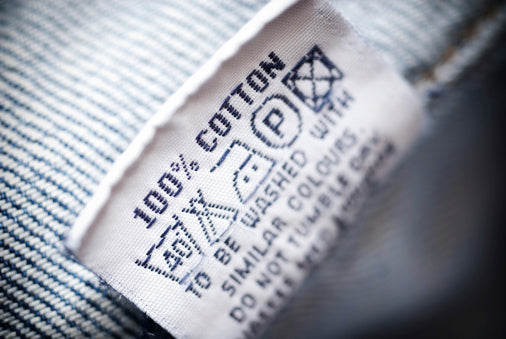 100% cotton material label on shirt