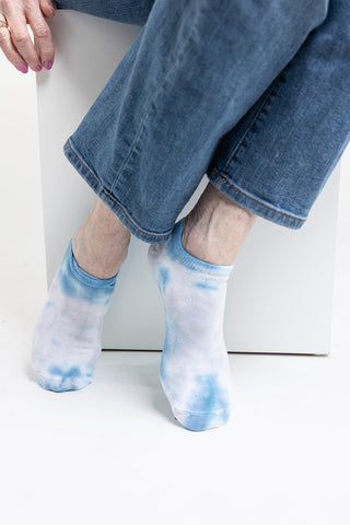 woman wearing tie-dye ankle socks