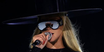 Beyonce wearing Loewe Paula's Ibiza LW40108I 01C with Silver Mirror on her Renaissance Tour