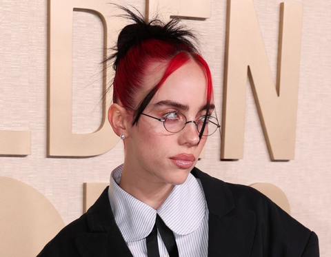 Billie Eilish wearing glasses at the Golden Globe Awards 2024