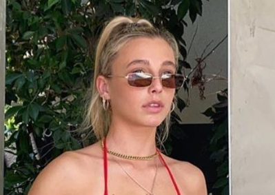 Emma Chamberlain wearing DMY by DMY Olsen sunglasses with brown lenses