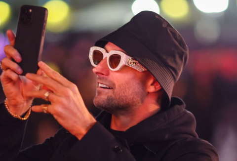 DJ Fisher wearing embellished Gucci sunglasses at the F1 Las Vegas Grand Prix 2023