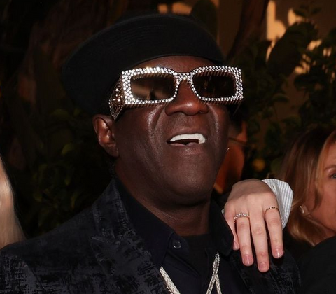 Flavor Flav wearing Gucci embellished sunglasses at the Golden Globe Awards 2024