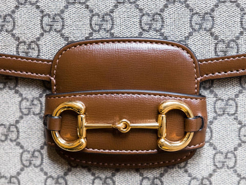 Gucci GG Horsebit bag design - gold buckle detailing