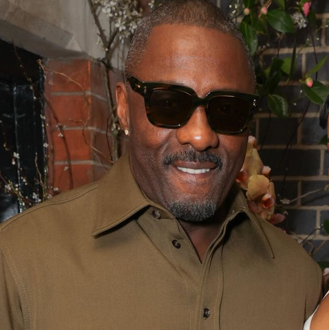 Idris Elba at the 2024 Grammy Awards wearing havana Gucci sunglasses