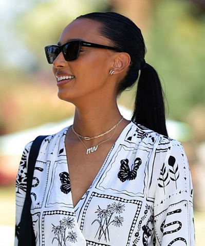 American model Jasmine Tookes wears black Saint Laurent Mica sunglasses at Coachella festival 2023