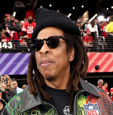 Jay Z at the Super Bowl LVIII wearing black sunglasses
