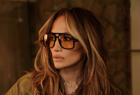 Jennifer Lopez wearing yellow lens sunglasses from Tom Ford