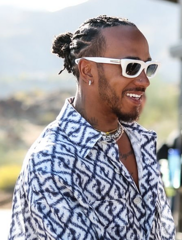 Lewis Hamilton at Coachella 2023 wearing a fendi Shirt and white Chrome Hearts sunglasses