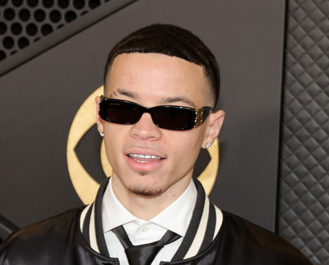 Lil Mosey on the red carpet at the annual 66th Grammy Awards wearing Balenciaga sunglasses