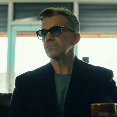 Max Beesley plays character Henry Collins in Netflix's The Gentlemen wearing Persol glasses