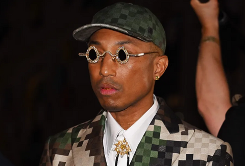 Pharrell Williams wears custom Tiffany sunglasses at Louis Vuitton fashion show