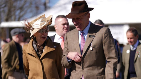 Princess Anne and chairman Martin St. Quinton attend the Cheltenham Races both wearing sunglasses
