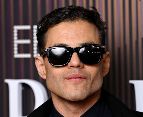 Rami Malek at the 2024 BAFTA Awards wearing black Cartier sunglasses