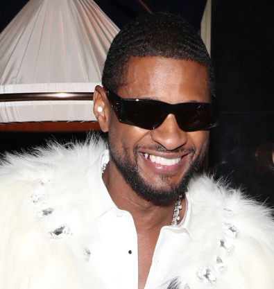 Usher wearing sunglasses after the Super Bowl 2024