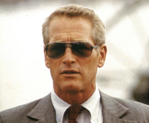Paul Newman wearing sunglasses in the movie 'The Drowning Pool'