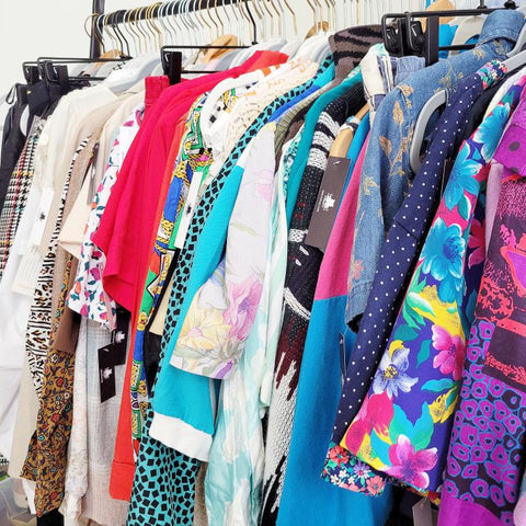 secondhand vintage clothes on a rack