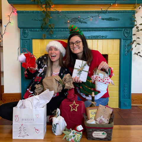 Jenny and Michaela with sustainably wrapped gifts