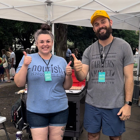 Nourish Knoxville employees giving a thumbs up!