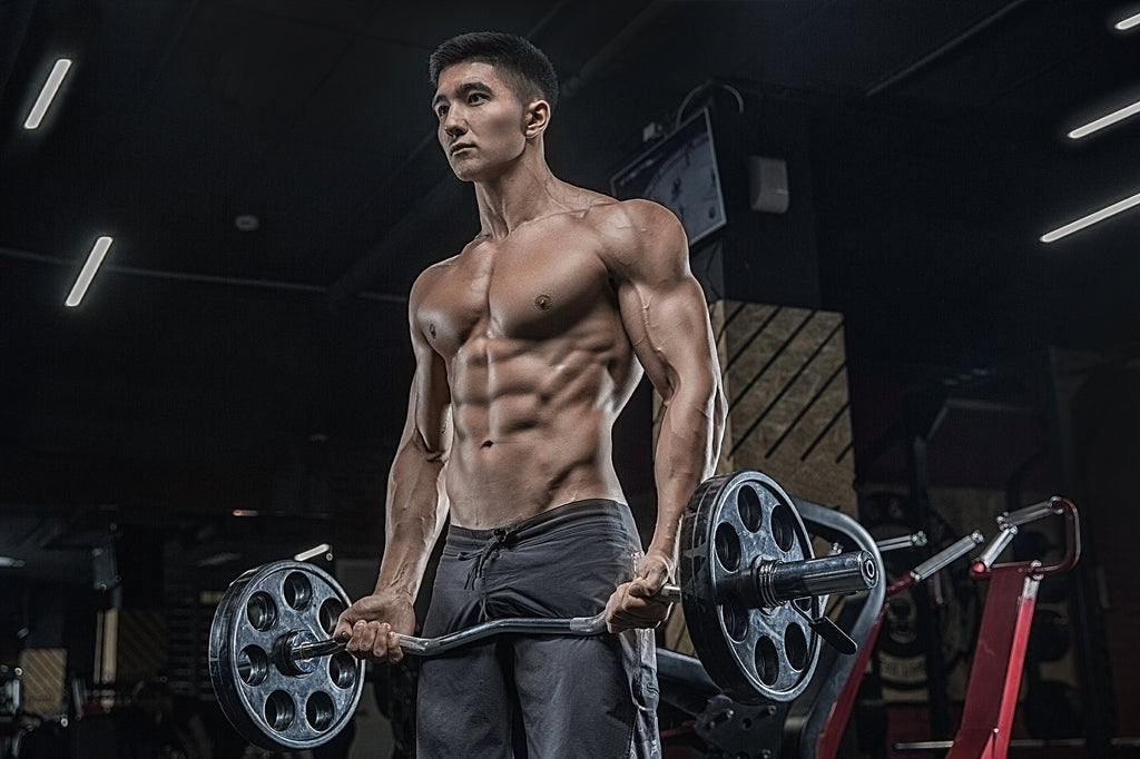 Muscular man holding weights