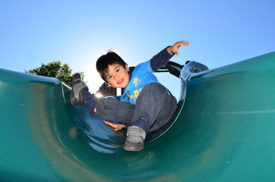 child on slide
