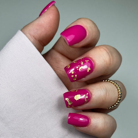 Pink nail design with gold foil