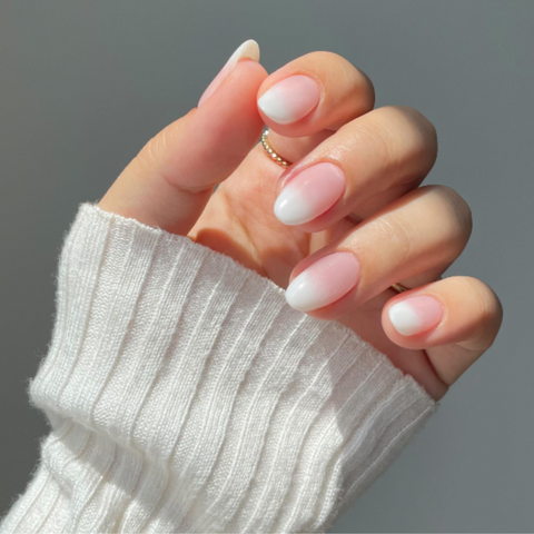 Oval nails in Baby Boomer look