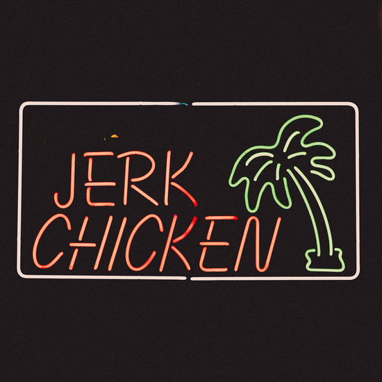 Image of jerk chicken neon sign for Caribbean restaurants London