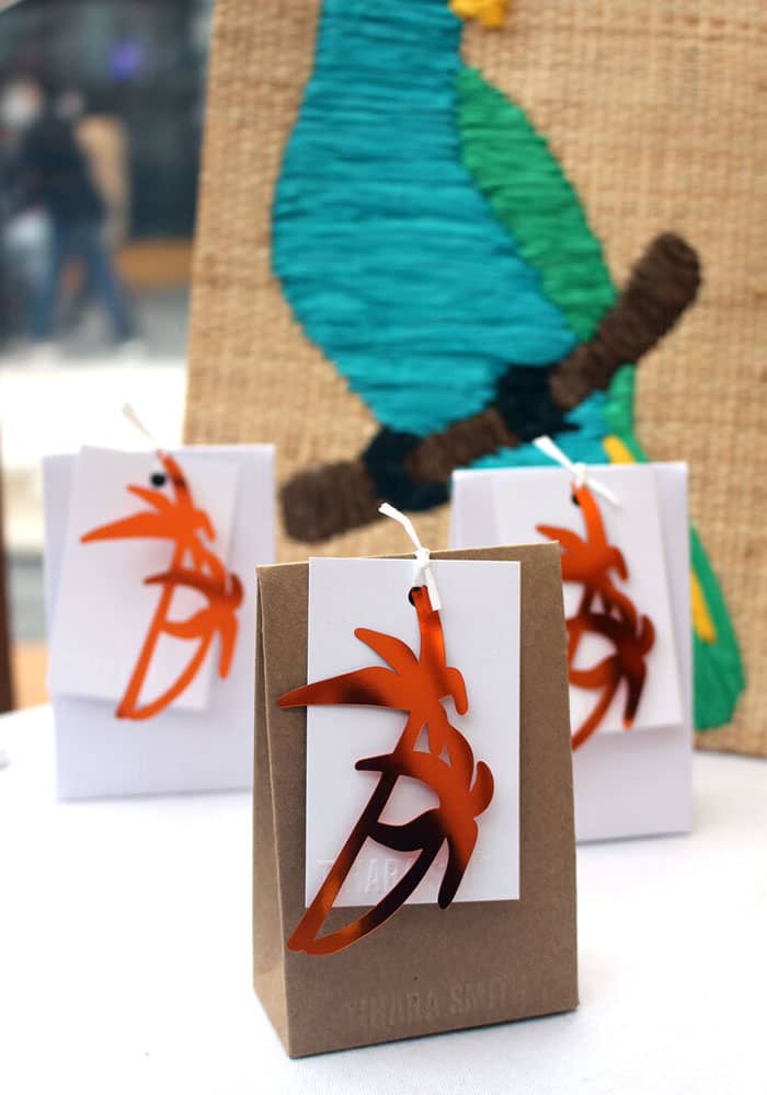 Tropical Pin Gifts Sets with palm tree shaped sequins in orange displayed at Sample Christmas 2019 