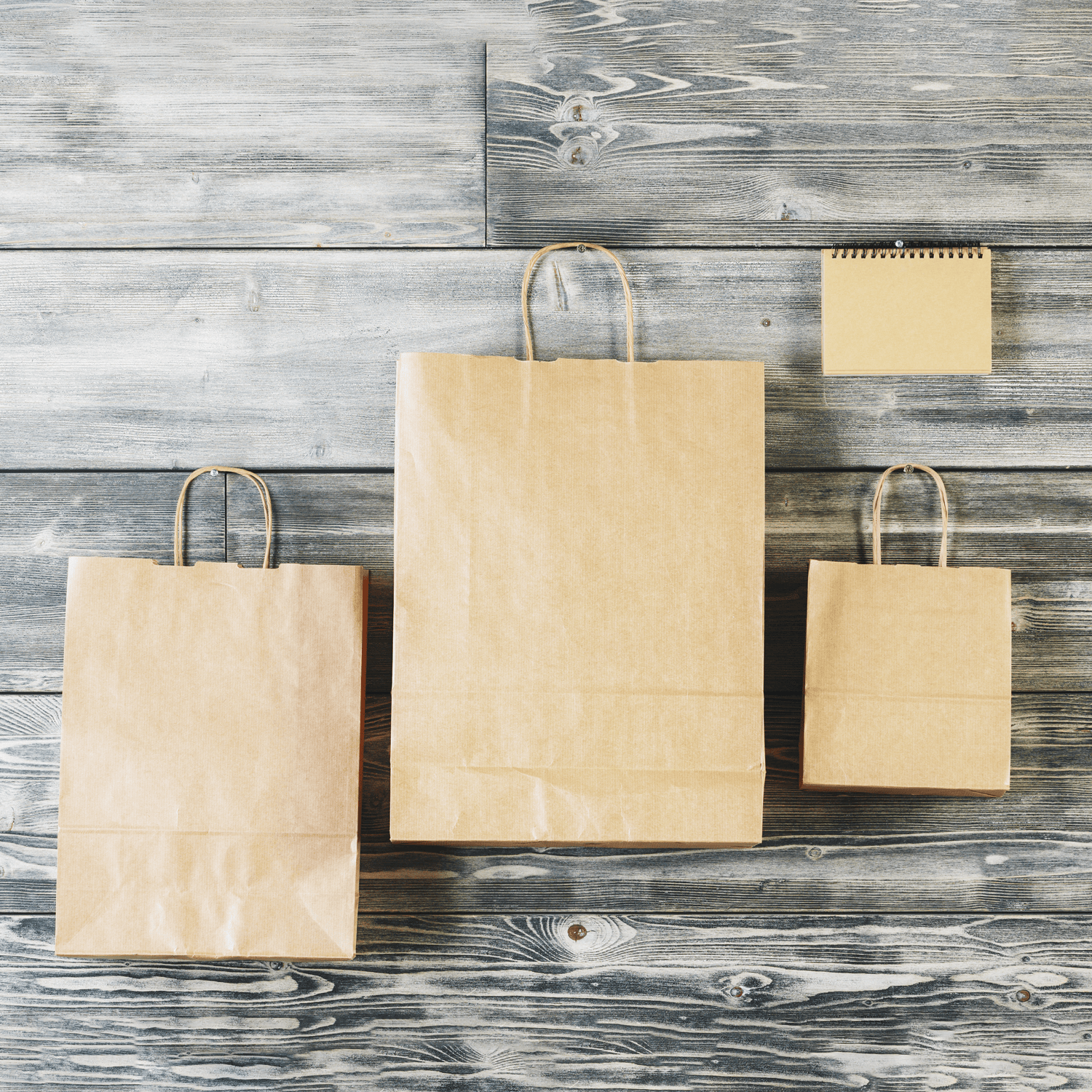 Recyclable Kraft paper bag with handles for shipping parcels internationally
