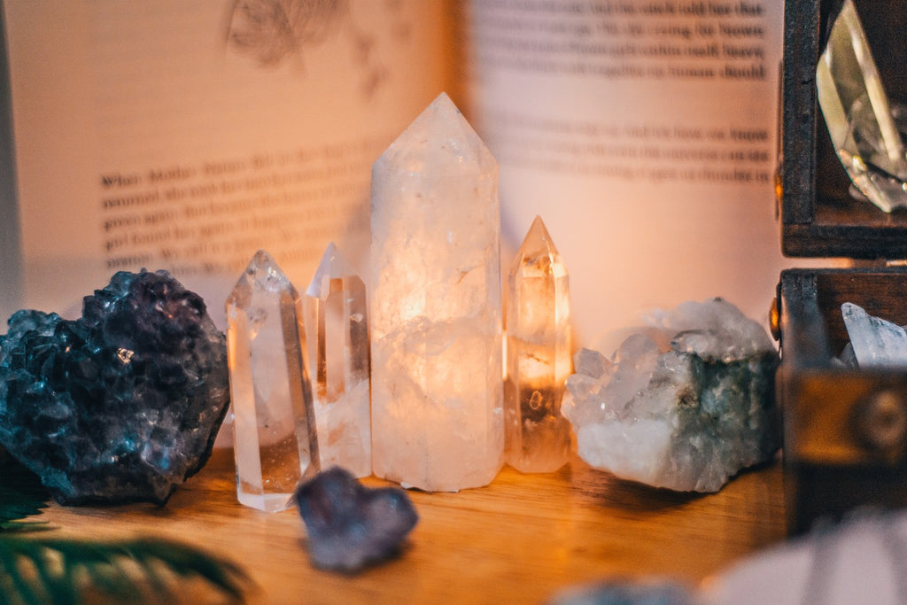 clear quartz points on wood