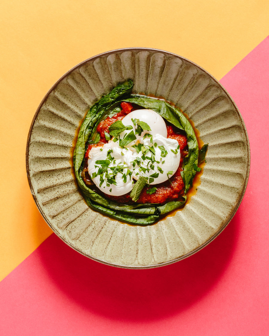 Poached Eggs with Morrocan Style Tomato Sauce, Sauteed Spinach & Zucchini