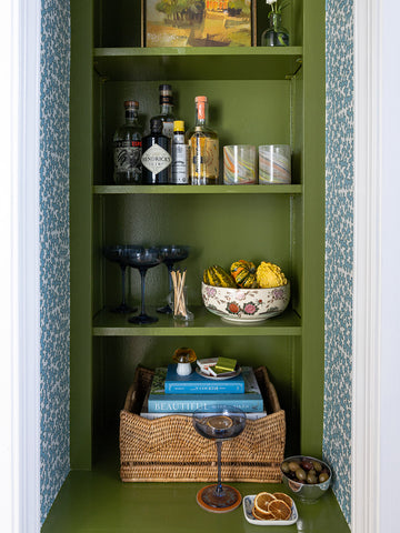 Interior Bar Nook with Green Painted High Gloss Shelves and Dover House Blue Wallpaper by Elliston House