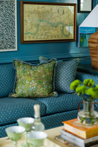 Meadow Multi Leaf fabric on this sofa pillow with teal brush fringe
