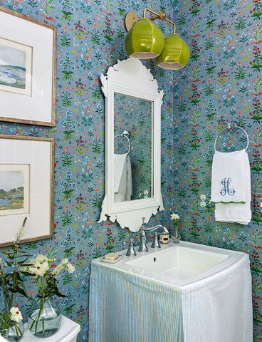Powder bath covered in Meadow Multi House Blue wallpaper