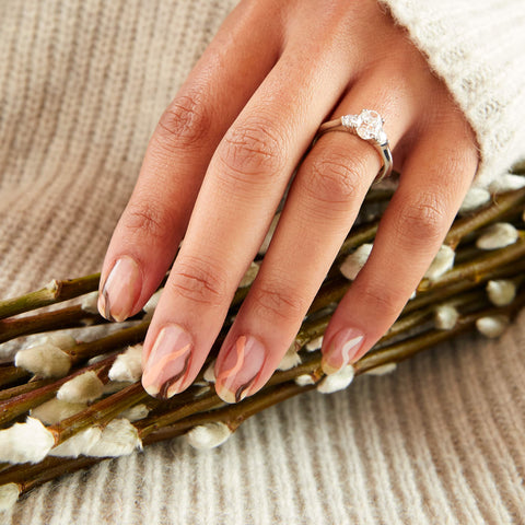 Platinum diamond engagement ring with diamond accents