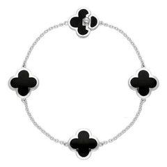 sterling-silver-whitby-jet-bloom-four-leaf-clover