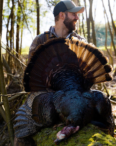 Nate holding turkey from successful diaphragm call usage