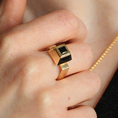Square black spinel set in yellow gold ring