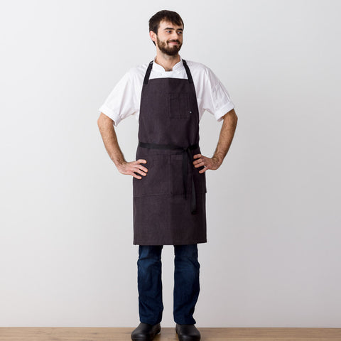 https://cdn.shopify.com/s/files/1/0523/1289/products/Apron_Black_Chef_Pockets_Adjustable_Men_large.jpg?v=1595598437