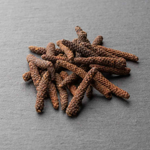 https://cdn.shopify.com/s/files/1/0523/1289/products/Cambodian_Kampot_Red_Long_Pepper_Mound_large.jpg?v=1559059877