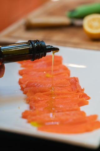King Salmon Carpaccio step two adding olive oil