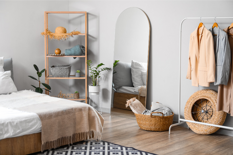 Bedroom with textured rug and woven baskets