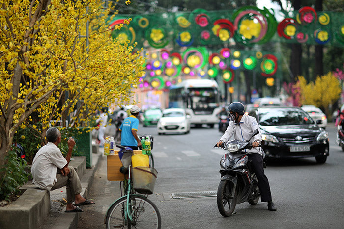 A local on a scooter in ho-chi-minh-city