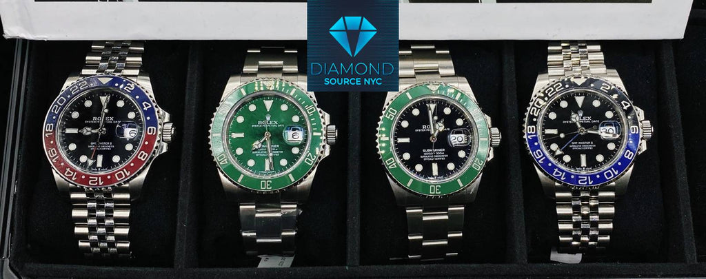 A display case showcasing various pre-owned Rolex Submariner models in stainless steel, two-tone, and gold options
