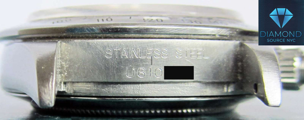Close-up of a real Rolex serial number engraving