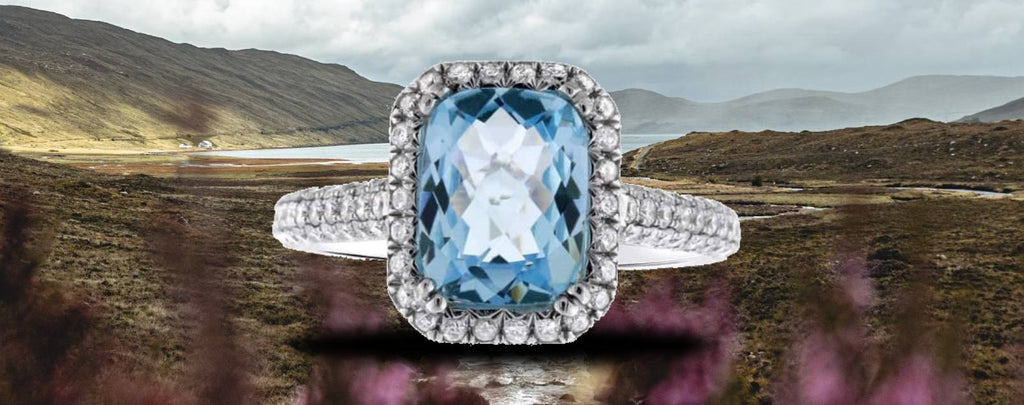 blue Aquamarine ring with 1.00CT in diamonds